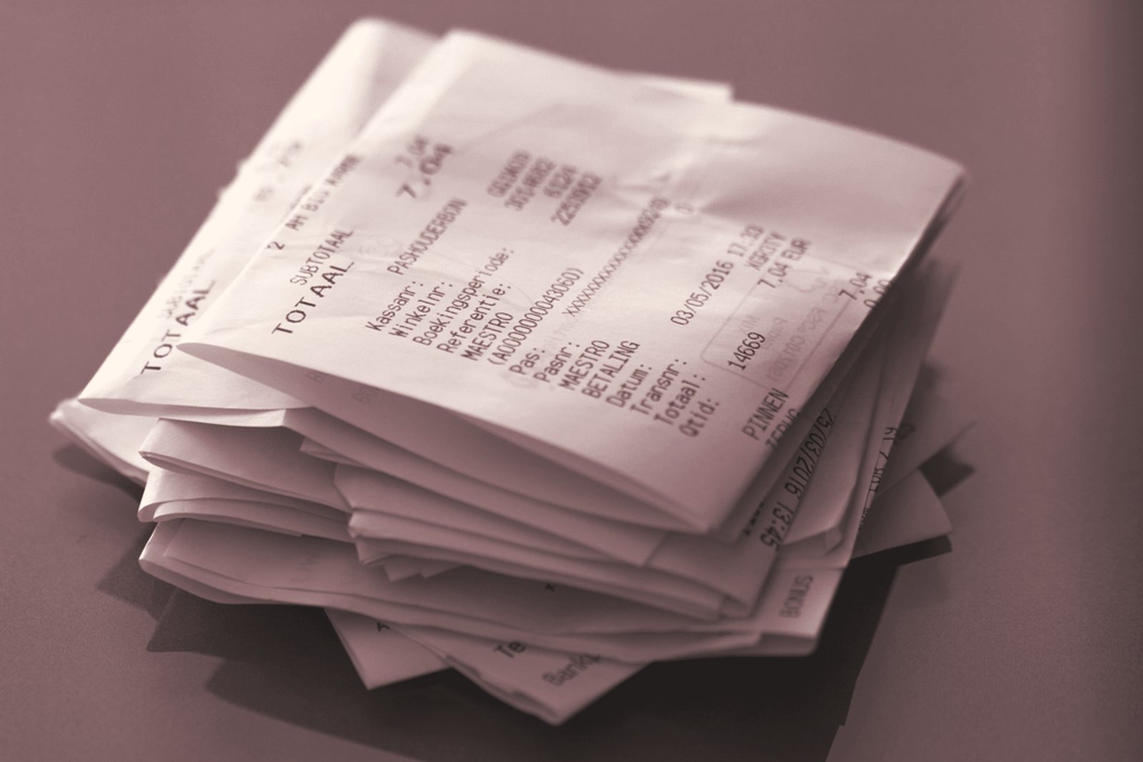 A pile of shop receipts